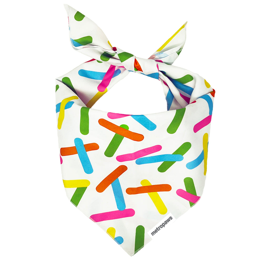 Metro Paws Pawty Bandana tied up featuring a colorful sprinkles design